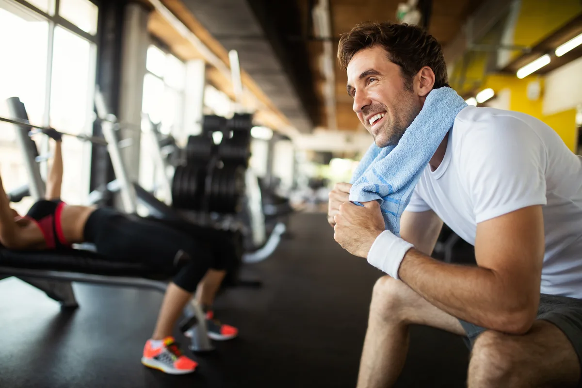 Athletic man cooling down after a gym session